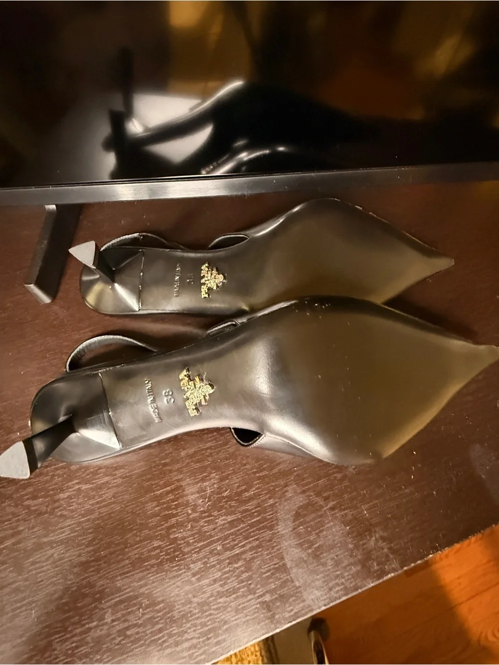 Prada Black Leather Pointed Slingback Heels with Logo Plaque